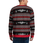 Person wearing a festive sweater with red, black, and white pattern on a white background
