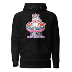 Black hoodie with a cartoon unicorn design and 'Relax, You're Magic' text on a white background